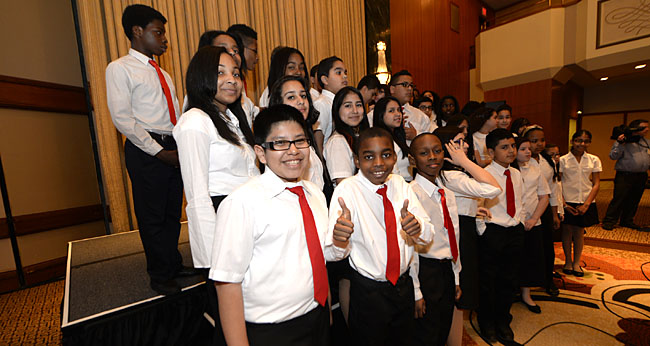 Members of the middle school choral group from PS/IS 127 in Manhattan treated delegates to several songs, including Louis Armstrong’s “What a Wonderful World.”