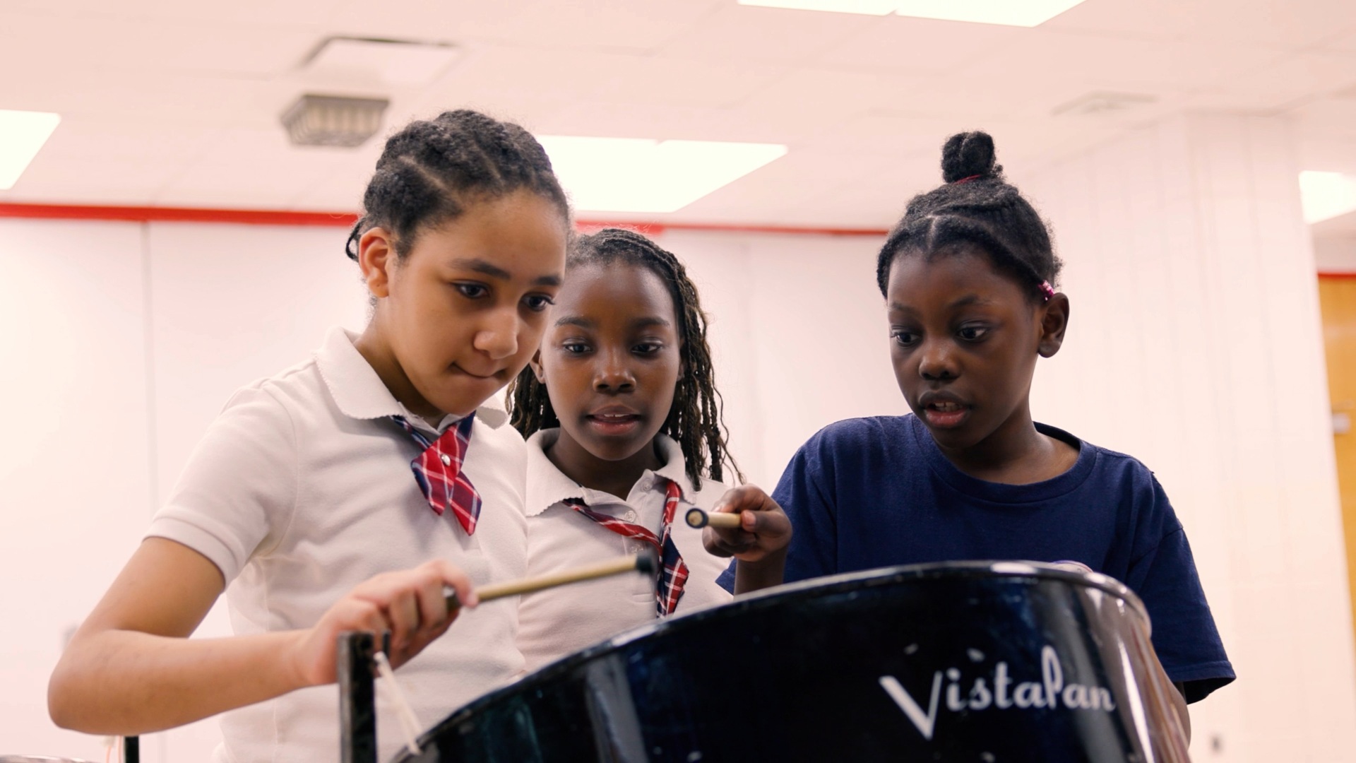 Students playing instrument