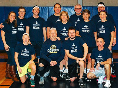 Members of the Cohoes TA, joined by a district administrator and a parent, are ready to play the Harlem Wizards in a charity game.