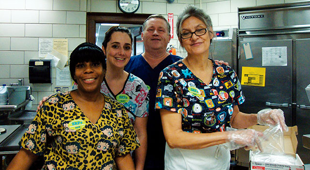 The professionalism of Syracuse TA members at the Webster school were on full display when they were asked to feed the entire student body in just under one hour. Above, from left, School-Related Professionals members Lynette Warren, Suzanne Pena, Larry Brennan and Marilyn Sutliffe served more than 600 lunches in record time when they learned the school was closing early due to a water main break. Kudos!