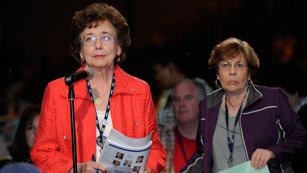 delegates at mic