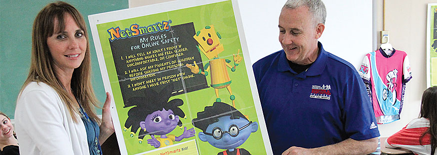 School counselor Shannon Britten, Galway TA member, and John Kelly, community educator for the National Center for Missing and Exploited Children, during a recent school program about Internet safety. Photo by Andrew Watson.