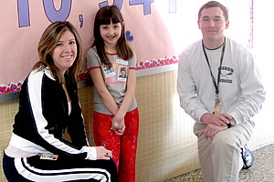Jeanne Gilbert and Matt Golini, physical education teachers and members of the Sachem CTA, stand with second-grader Kaitlyn Hall, who collected the most money for the Nokomis Elementary School's recent fundraiser for the American Heart Association. A remarkable $11,516 was donated to support efforts to fight heart disease.
