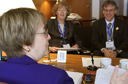 Professional Staff Congress President Barbara Bowen and First Vice President Steve London (background) discuss proposed cuts to community colleges with Assemblywoman Deborah Glick (D-Manhattan) during NYSUT's Committee of 100 lobby day March 24 in Albany.