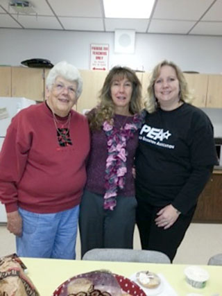 Penfield teaching assistant Nancy Sanders, secretary Mary Zweifel, and teacher Sue Mietus at Bay Trail Middle School for SRP Recognition Day. 