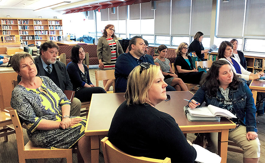 North Country educators listen to the Whitney Point team talk about building a community school model from the ground up. Student Mackenzie St. John, who now serves as a program student mentor, is planning to become a social worker. Photo by Sylvia Saunders.