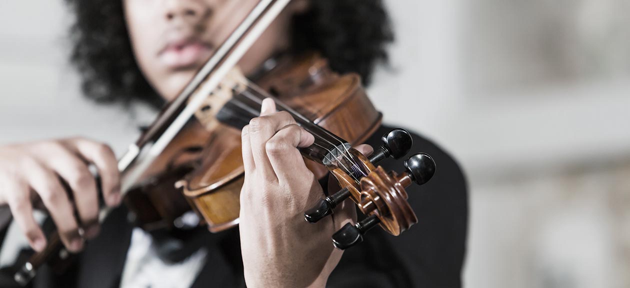 student playing violin