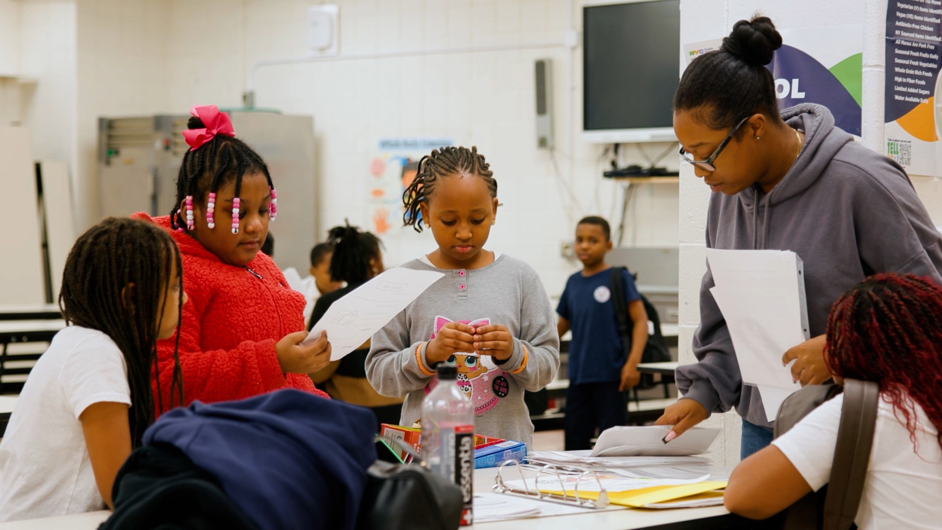 PS 399 kids at homework table