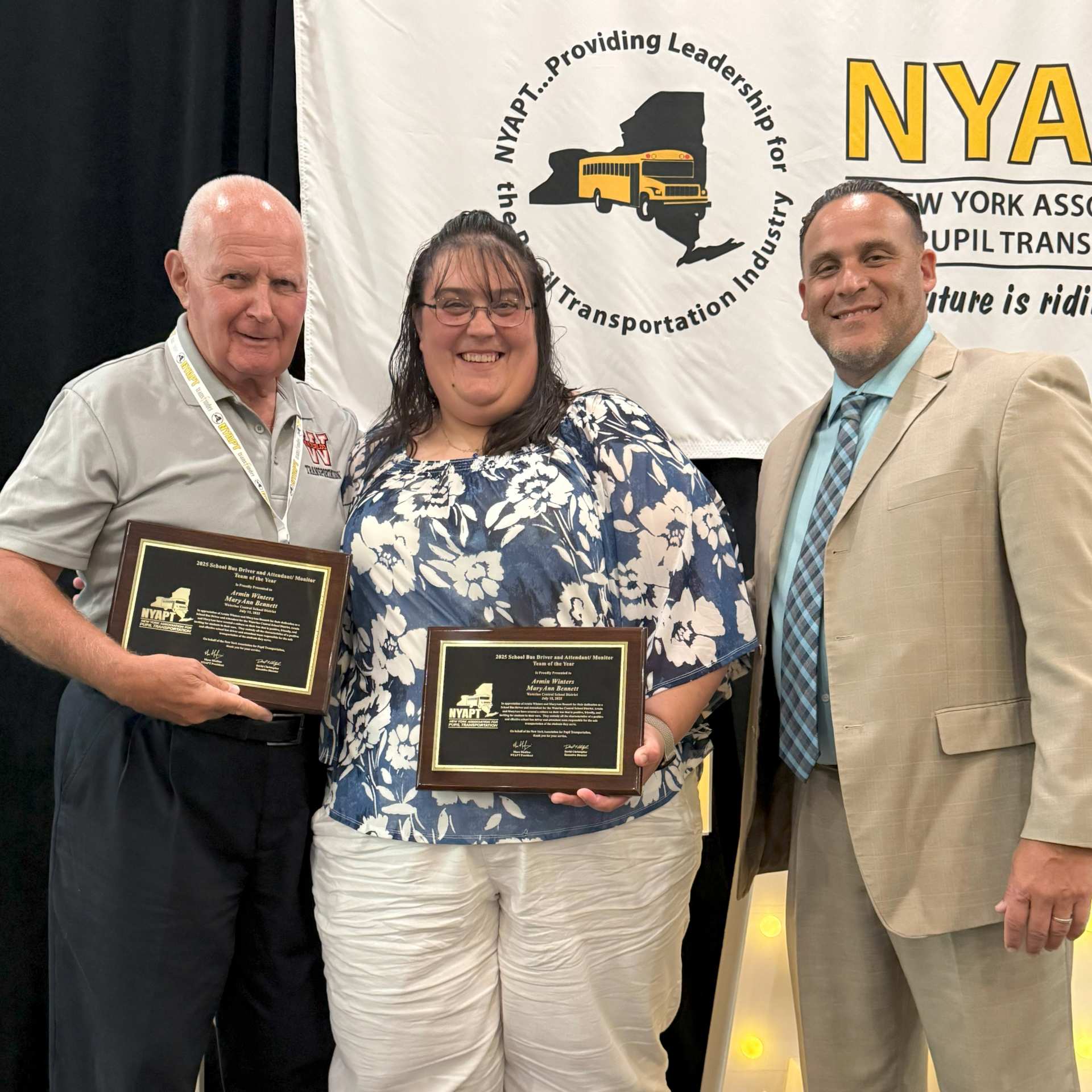 Armin Winters (left) and Maryann Bennett were named Bus Driver/Attendant Team of the Year by the NYAPT and honored at an award ceremony. Both are members of the Waterloo Non-Instructional EA as well. 