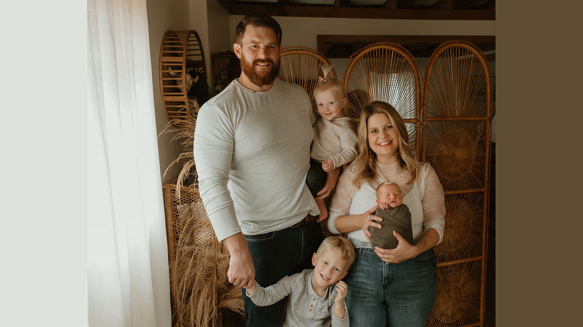 Perry Professional Educators Association member Kathryn Luczak, pictured with her family, was relieved to learn her union had successfully negotiated paid maternity leave when she found out she was unexpectedly pregnant with her third baby.