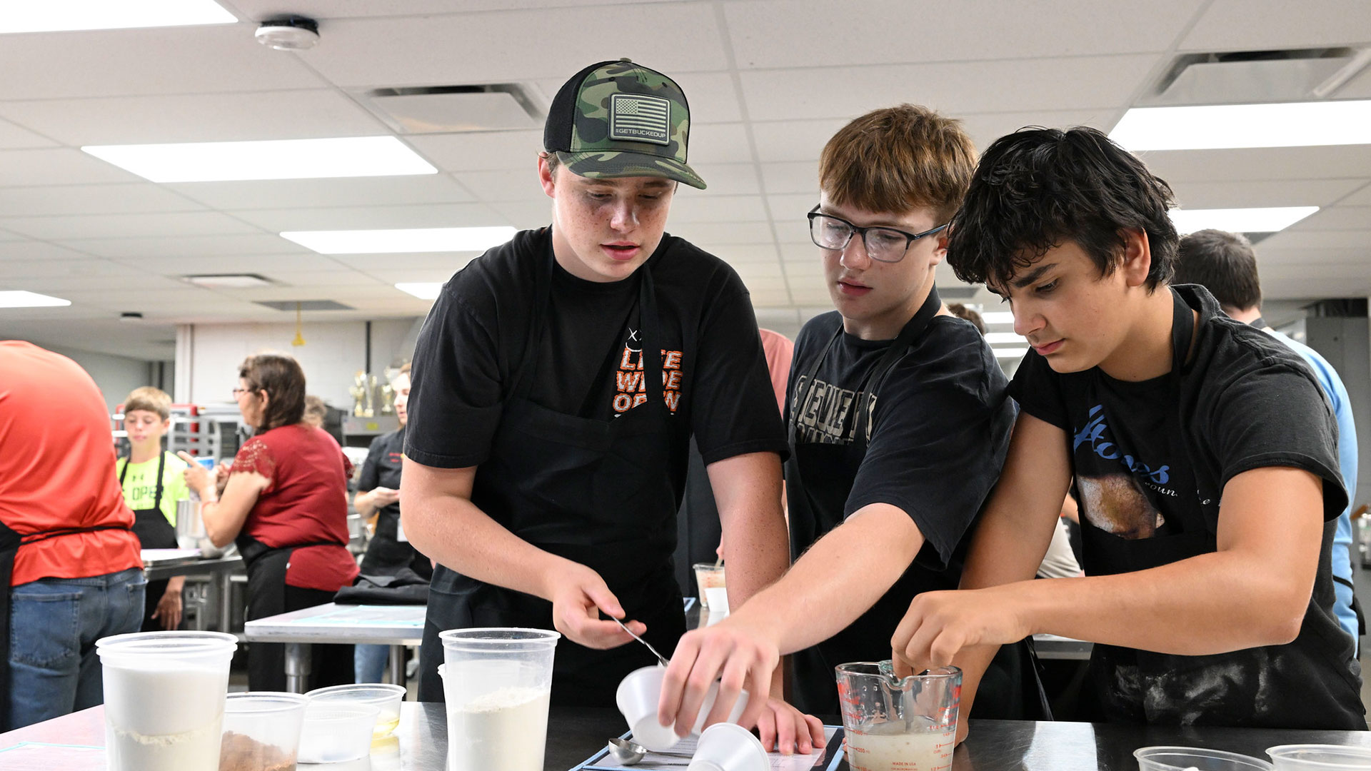 Students work together in Mary Nescot’s culinary class to make pizza dough. The culinary class is part of Questar III BOCES’s CTE Summer Camp, where 8th-, 9th-, and 10th-graders are introduced to high-demand career fields. 