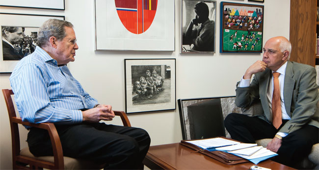 Peter Edelman, at left with U.S. Sen. Robert F. Kennedy in the mid 1960s, and above, in conversation with NYSUT President Dick Iannuzzi in the author’s Washington, D.C. office.