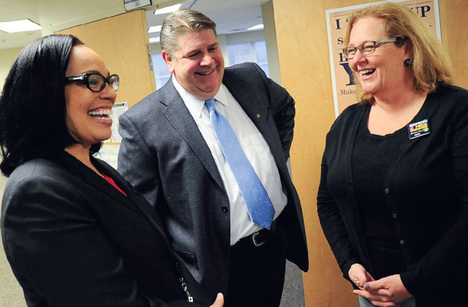 From left, Syracuse School Superintendent Sharon Contreras, Syracuse TA President Kevin Ahern and NYSUT President Karen E. Magee speak at the district’s First Book campaign kickoff event.