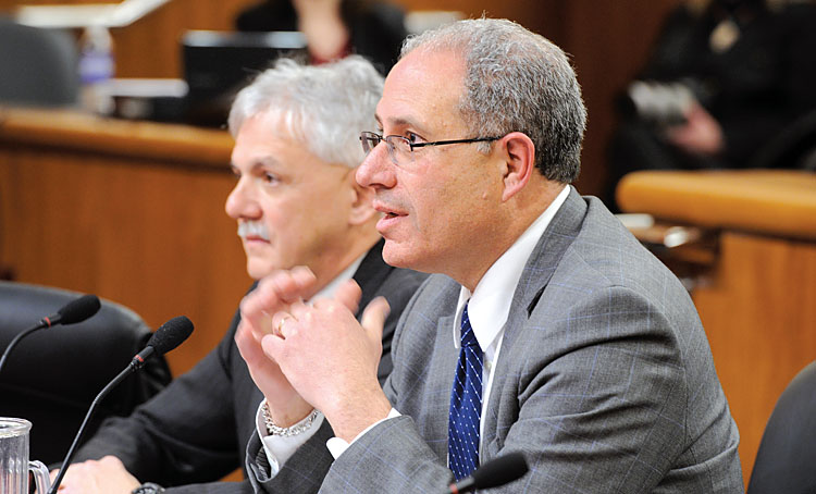 NYSUT Executive Vice President Andy Pallotta, right, with Director of Legislation Steve Allinger, tells the joint legislative hearing that the state must more than double the governor’s proposed aid to education to $1.9 billion.