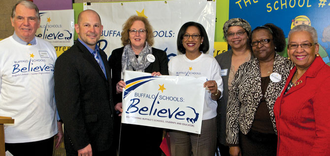 Buffalo TF President Phil Rumore; Larry Scott, co-chair of the new Buffalo Parent-Teacher Organization; NYSUT President Karen E. Magee; Pamela Brown, superintendent of Buffalo schools; Roberta Cates, BPTO co-chair; BEST President JoAnn Sweat; and Barbara Seals Nevergold, Buffalo school board president, at the media event. Photo by Dennis Stierer.