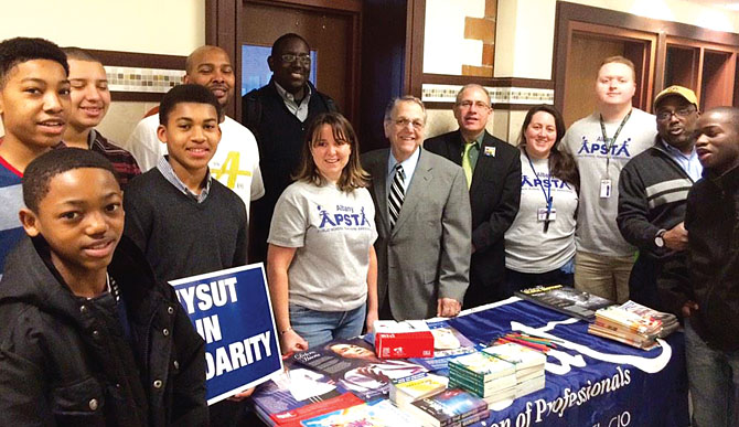 NYSUT’s former Executive Vice President Alan Lubin and current Executive Vice President Andy Pallotta, center, join members of the Albany Public Schools Teachers Association and students at the Martin Luther King Labor Celebration in Albany.