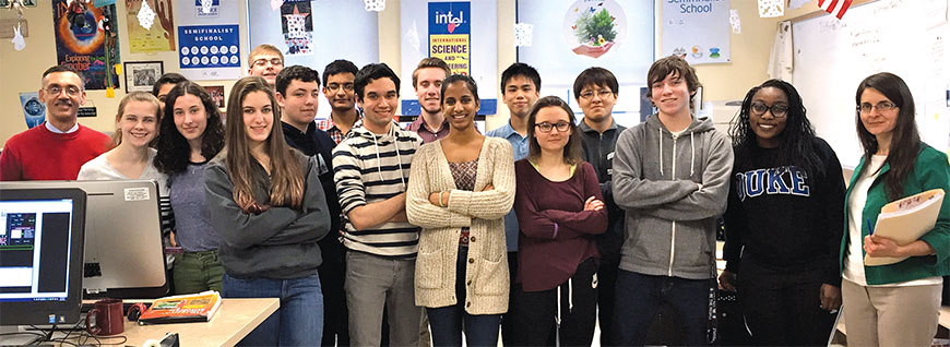 Ossining Teachers Association’s Angelo Piccirillo, far left, and Valerie Holmes, far right, with students in the high school’s year-round science research program.