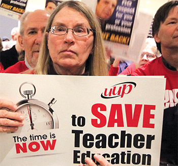 UUP New Paltz Chapter member Carol Reitsma is part of a long procession during a "Call Out Cuomo" rally at the Capitol. Photo by Karen Mattison.