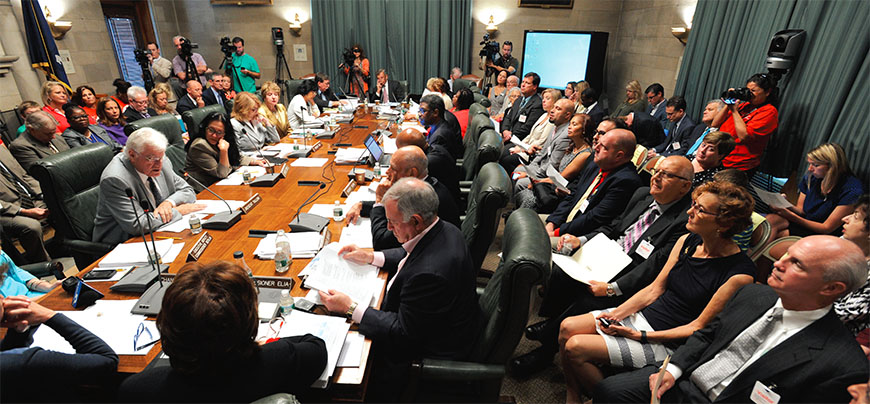 The Board of Regents, surrounded by media and other interested parties, including NYSUT leaders and staff, directs State Education Commissioner MaryEllen Elia to work on much-needed changes to APPR. Photo by El-Wise Noisette.