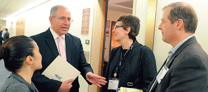 From left, NYSUT legislative staff member Alithia Rodriguez-Rolon and Executive Vice President Andy Pallotta meet with PSC staffer Kate Pfordresher and PSC member Alex Vitale at Committee of 100 Lobby Day.