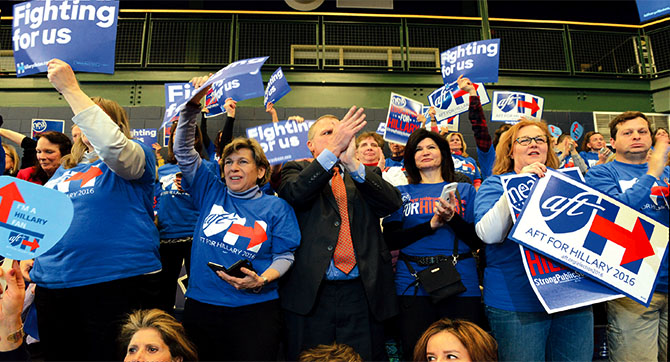 AFT President Randi Weingarten, left center, NEA President Lily Eskelsen Garcia, second from right, and NYSUT President Karen E. Magee lead the charge for Hillary.