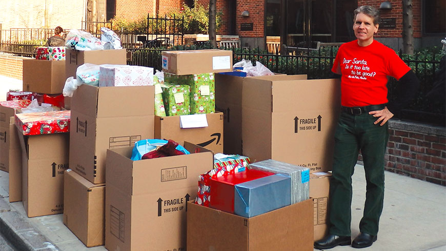 UCATS President Steve Rechner. Members of his local donated gifts for 40 children through the Stockings with Care program and First Book.