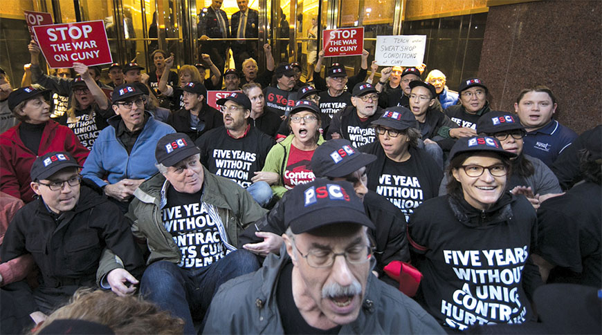 PSC members, joined by NYSUT officer Martin Messner, far right, protest at CUNY offices.