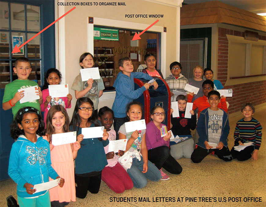 Students at Pine Tree Elementary School in Monroe display thank you letters they mailed to SRPs at the school’s “post office.” SRPs received more than 800 letters from students.