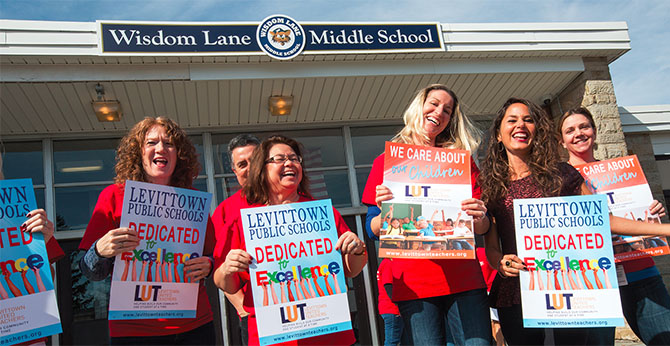 On Long Island, members of the Levittown United Teachers rallied for public education at Wisdom Lane Middle School.