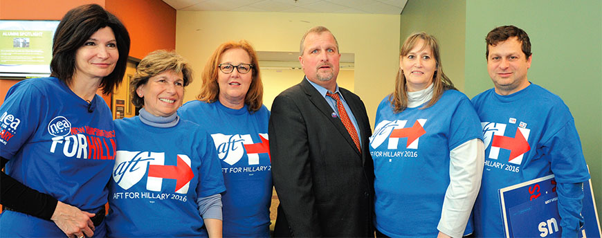 NEA President Lily Eskelsen Garcia, AFT President Randi Weingarten, NYSUT President Karen E. Magee, NEA–New Hampshire President Scott McGilvray, AFT–New Hampshire President Laura Hainey and NYSUT Vice President Paul Pecorale joined scores of activists from AFT and NEA locals in New Hampshire and the Northeast to show their support for Democratic candidate Hillary Clinton, left. During a rally, Clinton pledged to “support, not scapegoat, teachers.”