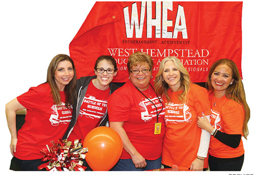 Members of the West Hempstead Educational Association — along with support from students, district staffers and the community — raised nearly $5,000 at the union’s eighth annual Battle of the Schools fundraiser. All proceeds from the event go to fund scholarships for graduating seniors. Above, from left, Stacy Gulisano, Jaclyn Klafter, Denise Frary, Lisa McCarthy and Daisy Weinsten help staff the event.