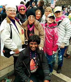 At the Women's March in Washington, D.C., from left, Bonnie Bielas, Vilma Elliot, Linda Vanbrabant, Valerie Sandstrom, RC 10 member Marie Miklic, Jane Arvanites, Andrea Lee and Maxine Brisport, kneeling, Troy Teachers Association.