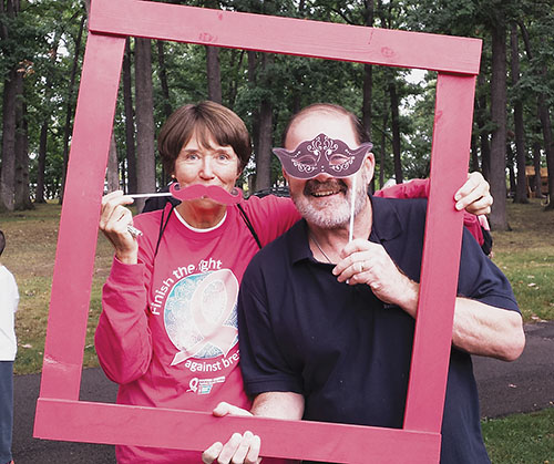RC 11 retirees Linda and Ben Frisbie of the Owego-Apalachin Teachers’ Association stop by the NYSUT photo booth at the Binghamton Making Strides Against Breast Cancer walk in October. The chapter raised $1,000 for the walk. Ben Frisbie is a former NYSUT Board member.