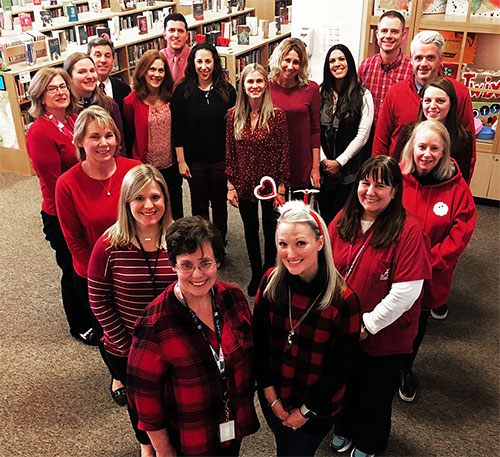 East Williston Teachers’ Association members form a heart to show how much they love public schools.