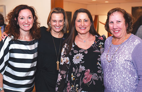From left: Great Neck TA’s Theresa Walter is with her mentors Sarah Duke and Gigi Mar¬asco, both Manhasset NBCTs, and Great Neck retiree Eileen Kurinskas, who started a teacher center program to help NBC candidates. Photo from Adelphi University.