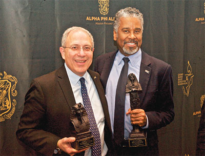 NYSUT President Andy Pallotta, left, and First Vice President/Secretary- Treasurer J. Philippe Abraham are honored by Alpha Phi Alpha during the NYS Association of Black and Puerto Rican Legislators caucus this winter. Photo by El-Wise Noisette.