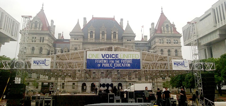 setting up the stage for the rally