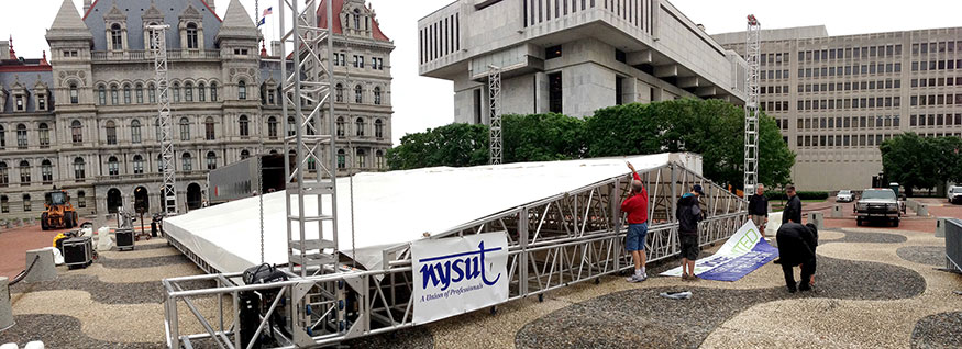 setting up the stage for the rally