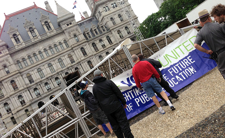 setting up the stage for the rally