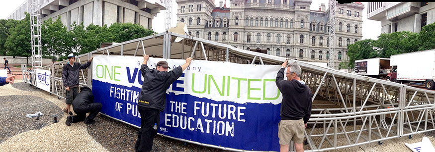 setting up the stage for the rally