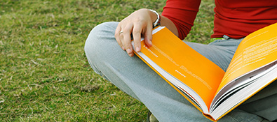 higher education - student with book