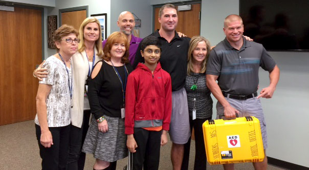 PICTURED left to right, from the back row: Tracey Baumann (nurse); Pam Seebald (physical education teacher); Dennis Horton (physical education teacher); Artie Friess (physical education teacher); Joan Keegan, (Principal and a former physical education teacher); Joe Welsh (physical education teacher); Dana Lieberman (school nurse); Sanketh Kumar (seventh grade student). Photo provided.