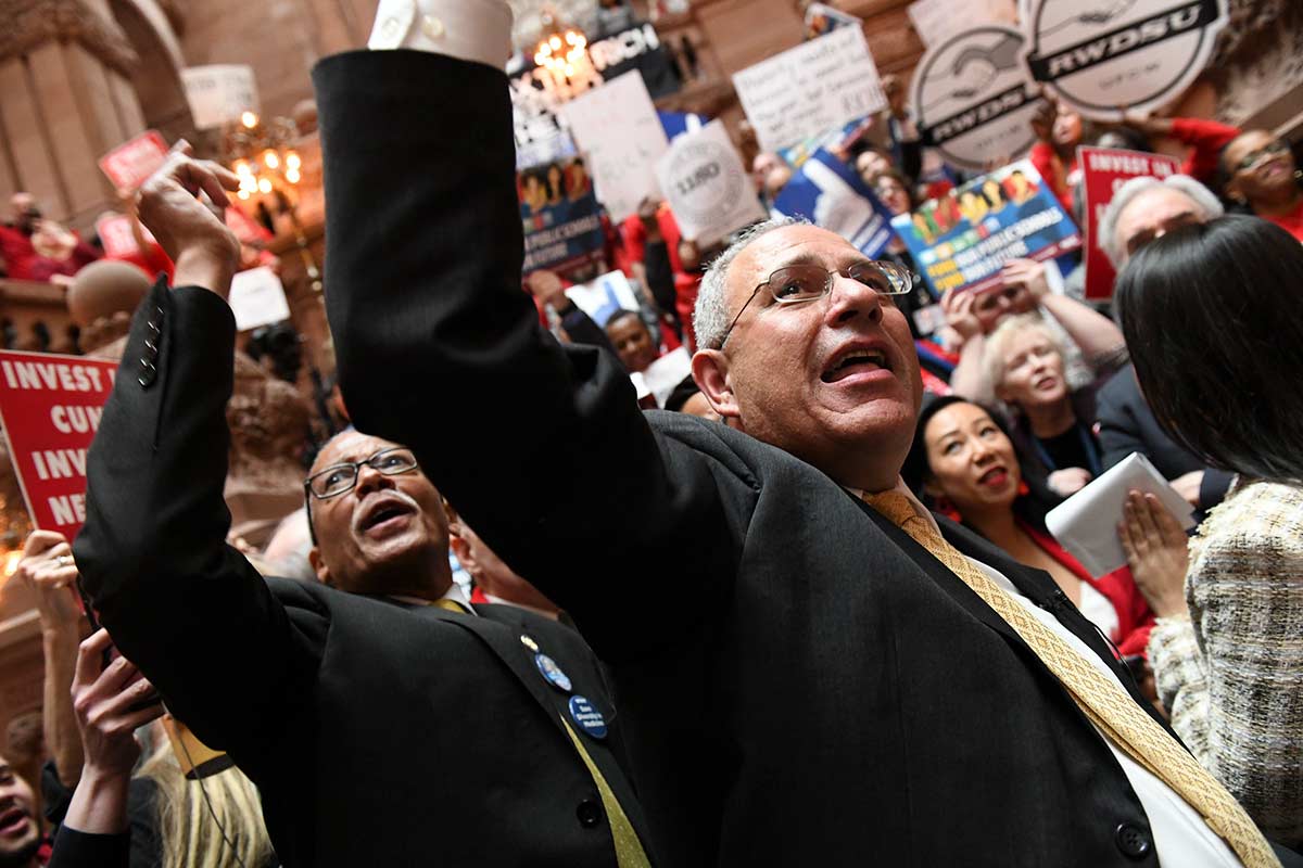 Sen. Robert Jackson, left, and President Pallotta rally supporters at a Fund Our Future event in the Capitol in 2020. Jackson was on the original CFE lawsuit in 1993.