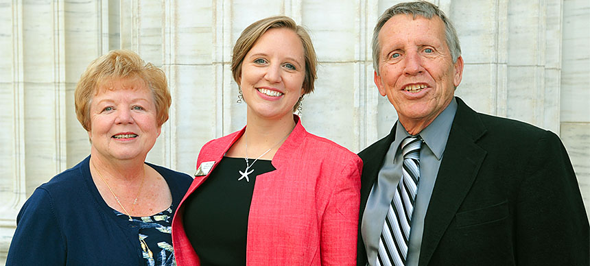 Amy Hysick, center, the 2017 New York State Teacher of the Year, is flanked by her parents, Judy and Jim Sonich, both retired North Syracuse teachers. Photo by El-Wise Noisette.
