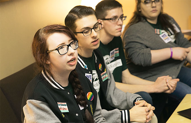 Jamestown Community College student Hannah Lorenc tells Assemblyman Andrew Goodell that lives are at risk because of gender discrimination.