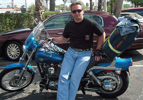 Once saved by a good Samaritan after a terrible motorcycle accident, United University Professions member Richard Glaser, pictured below, an IT professional staff manager at SUNY Stony Brook HSC, became a rescuer himself. While still recovering from a neck injury, he came to the aid of a young woman whose car went off the road and down a hill. He pulled the injured woman away just before the car exploded in flames.